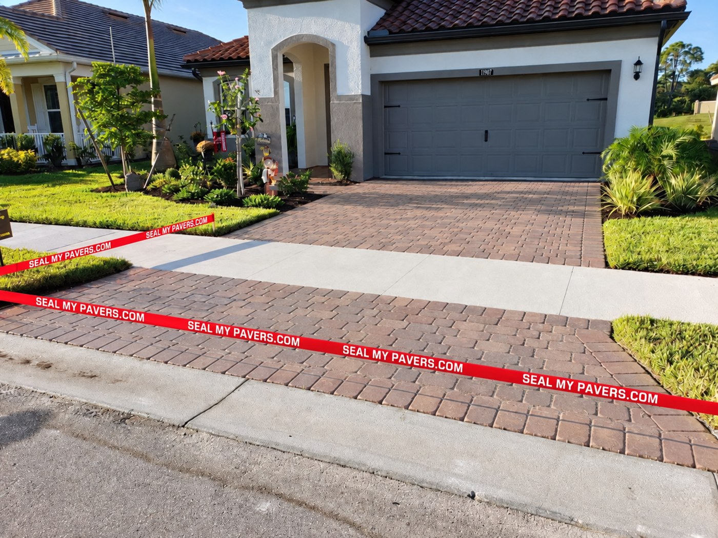 Dry, matte driveway pavers at Renaissance Drive in Venice, shown in the unfinished comparison.